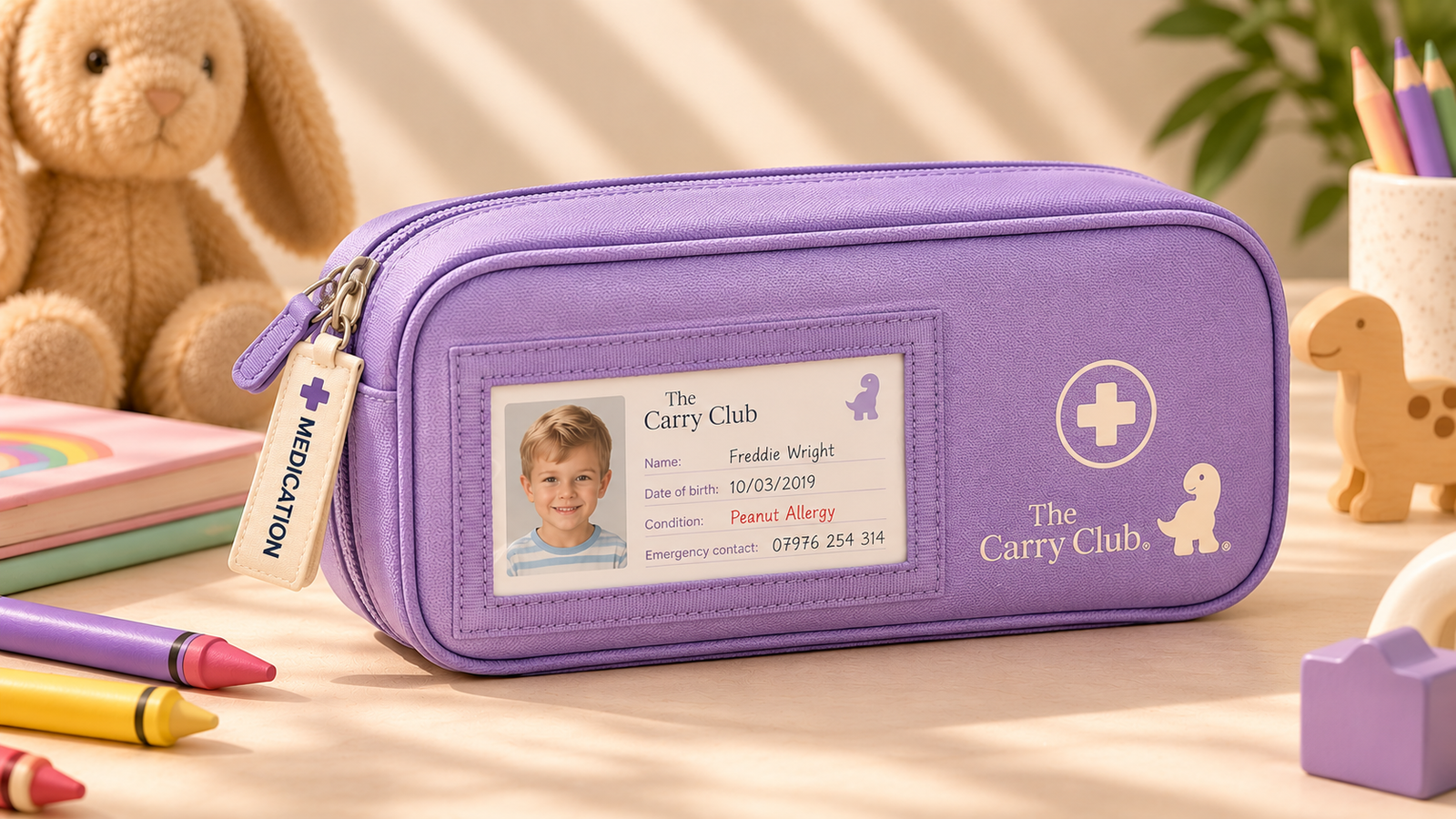 The Carry Club Kids Emergency Medication Case in Lavender with identification window, dinosaur detail and medication zip tab